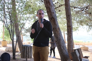 Gil talking to the group in Shilo